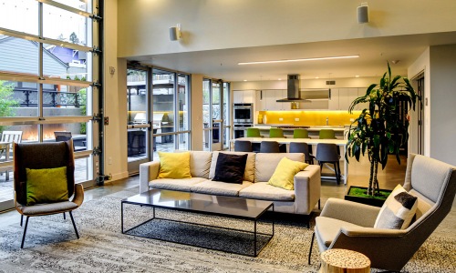 lounge area with couches and tv